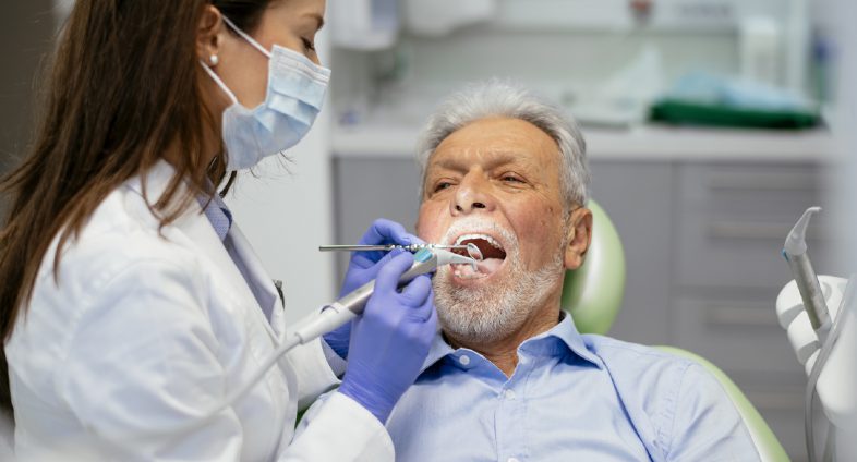 Senior-man-having-dental-checkup