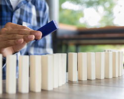 businessman with domino