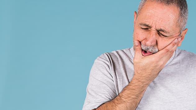 man with tooth ache.jpg
