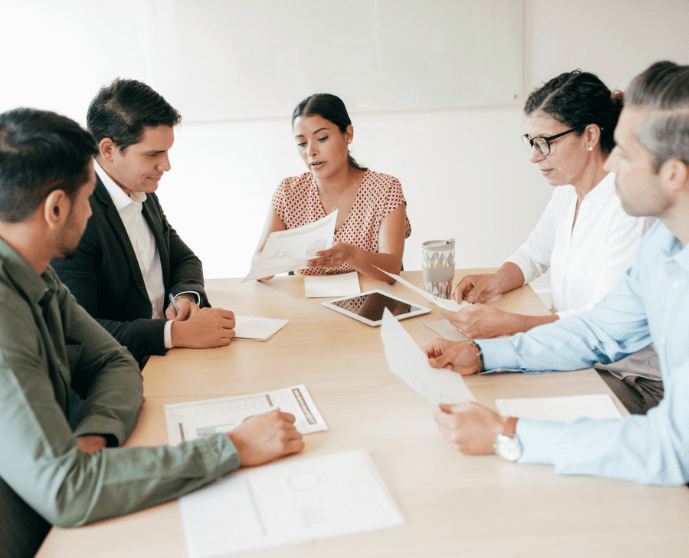 business people at a conference table