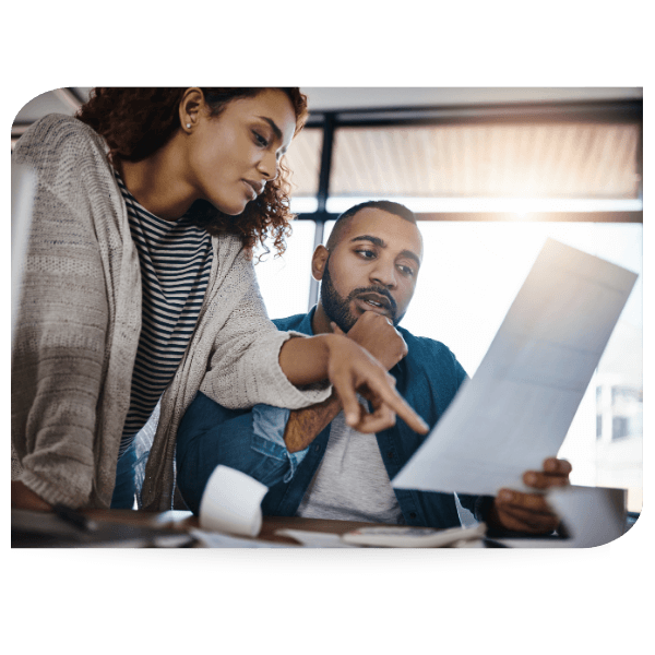 Woman explaining a report or contract to a man